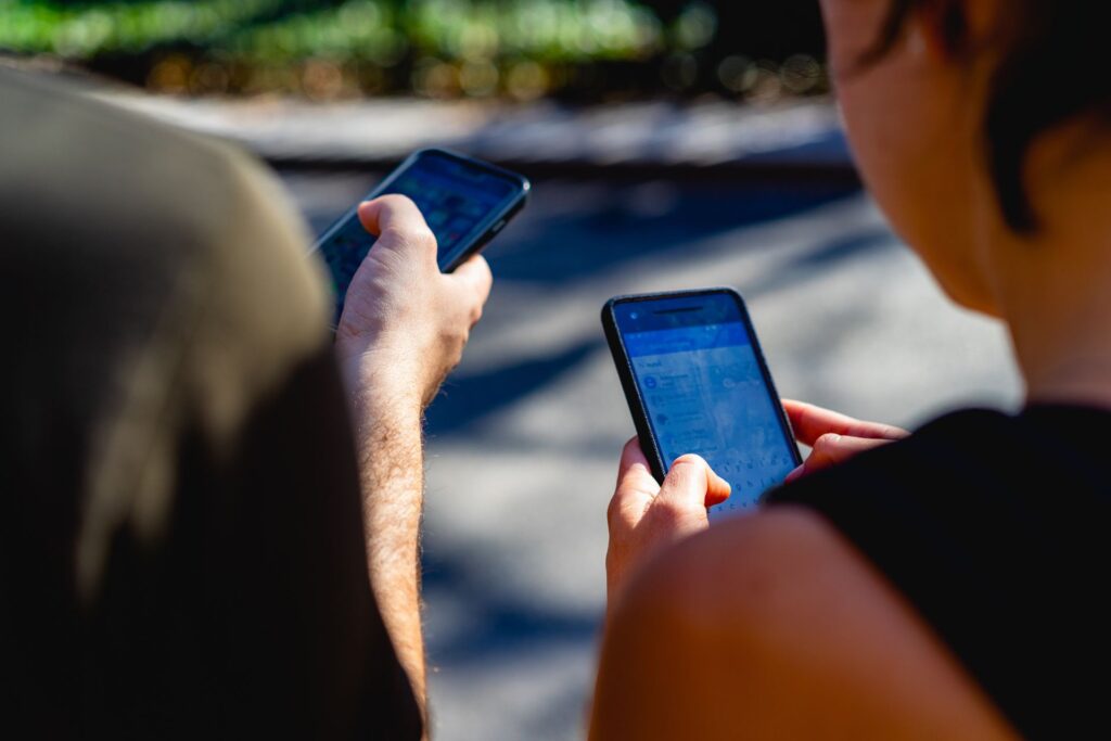 Travelers using their phones