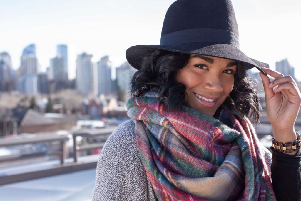 woman wearing a hat and a scarf