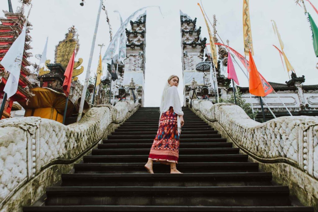 a female tourist in a bali temple