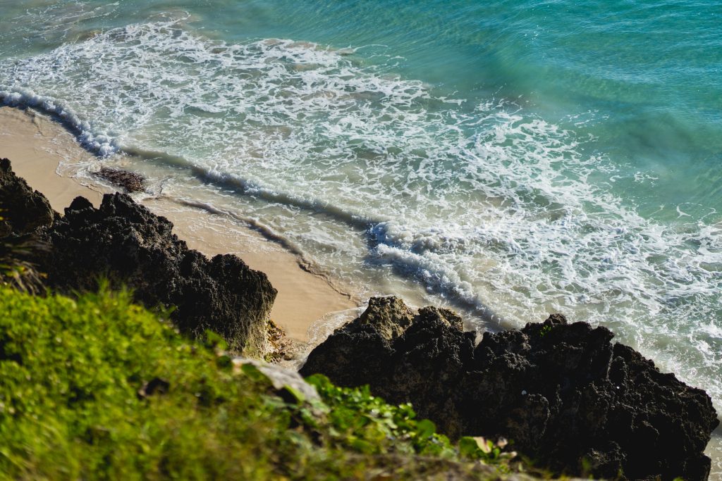 An aerial shot of a white sand beach on the Caribbean coast in Puerto Rico