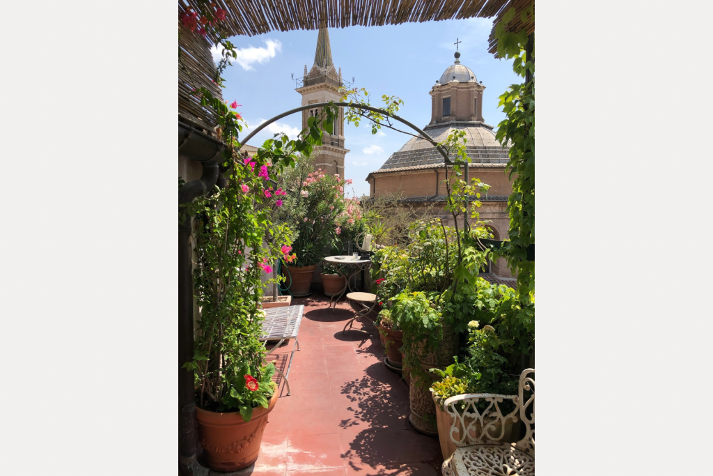 Lovely rooftop garden of the apartment in Rome.
